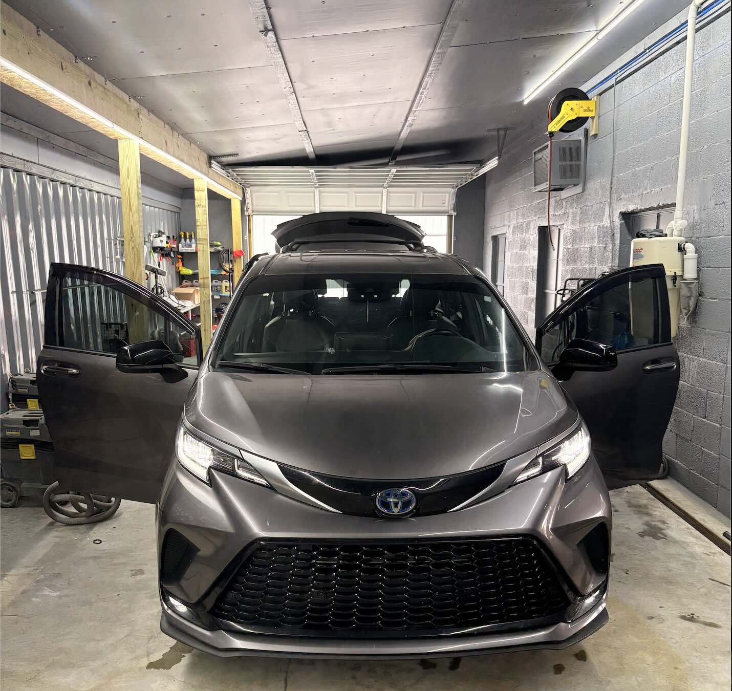 Toyota Sienna with doors open for interior detailing