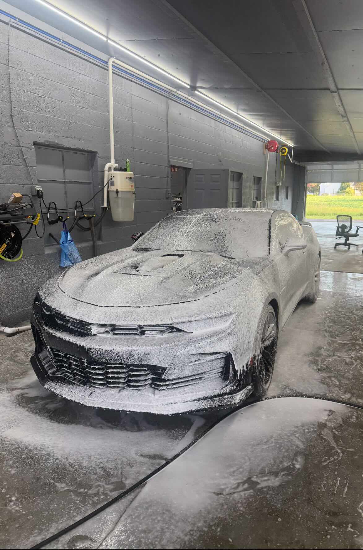 Camaro SS covered in snow foam